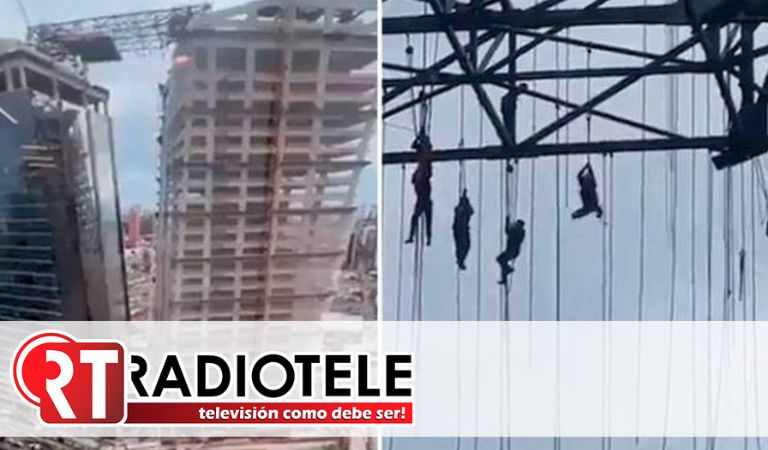 Trabajadores quedan suspendidos en el aire, a más de 100 metros de altura, tras colapsar andamio